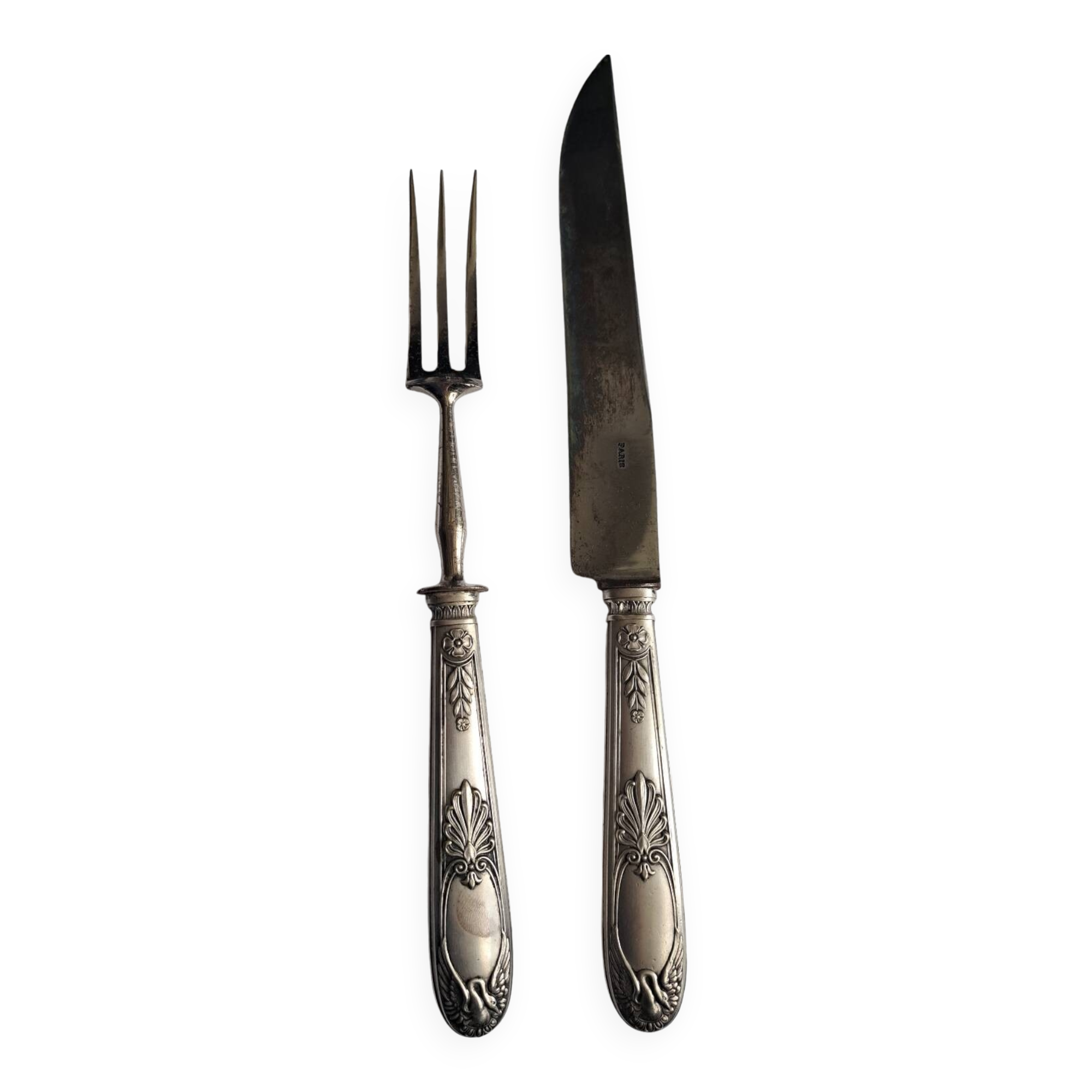 Silver-plated leg of lamb cutlery.