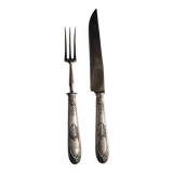 Couvert à gigot en métal argenté.
