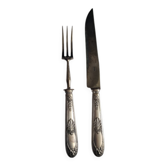 Silver-plated leg of lamb cutlery.