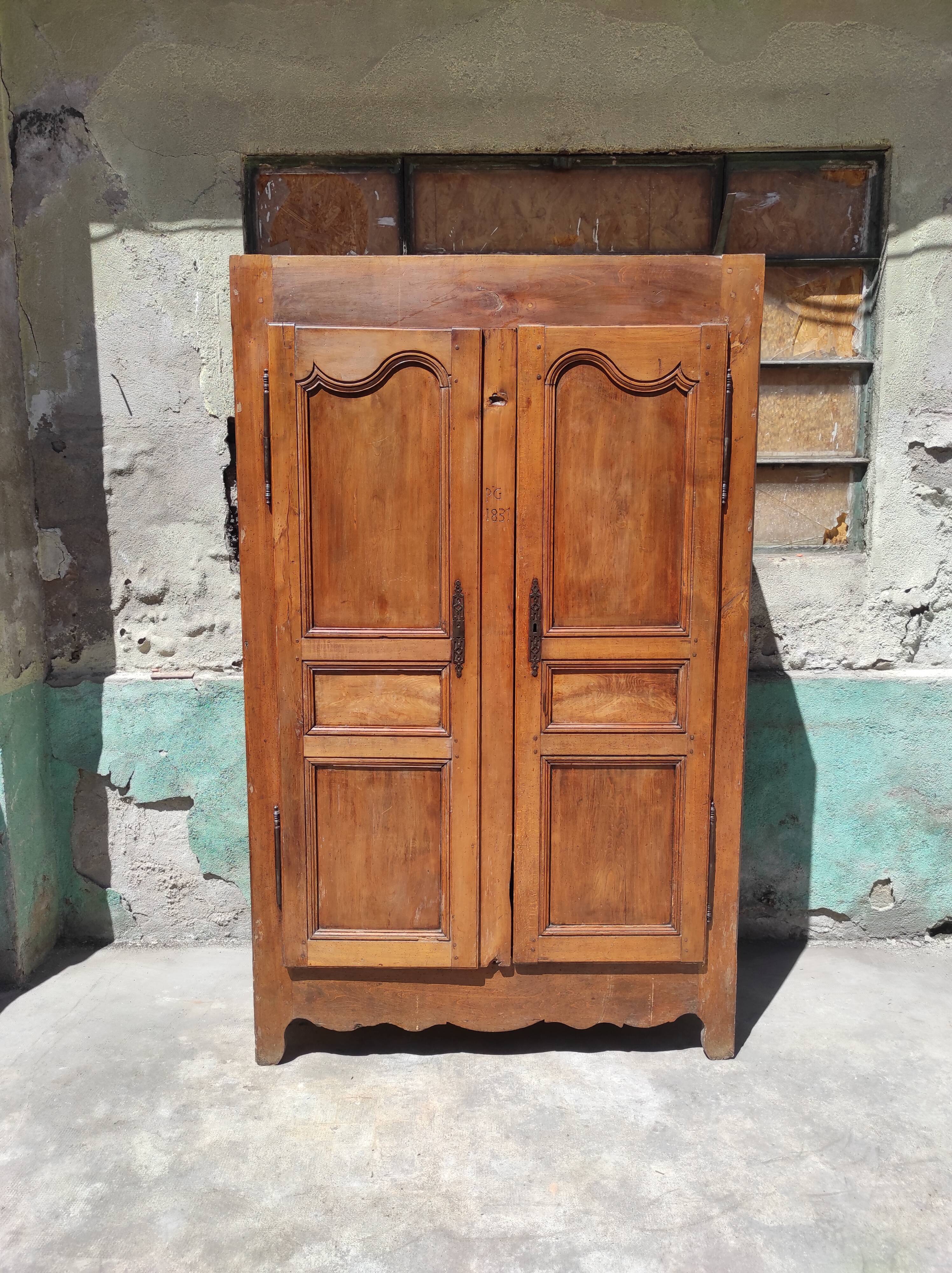 Old rustic oak cabinet of the 19th century louis 15 style
