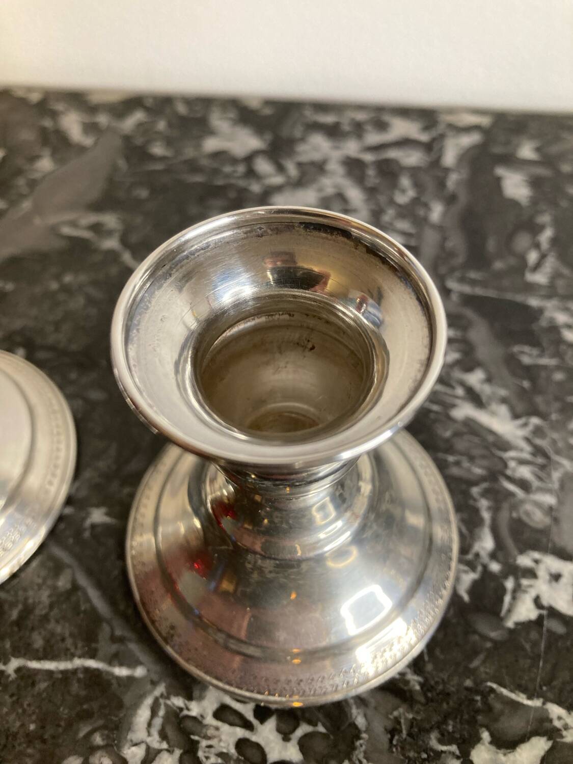 Pair of silver metal candlesticks