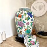Chinese enamelled earthenware jar with wooden base
