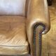 pair of camel leather club armchairs