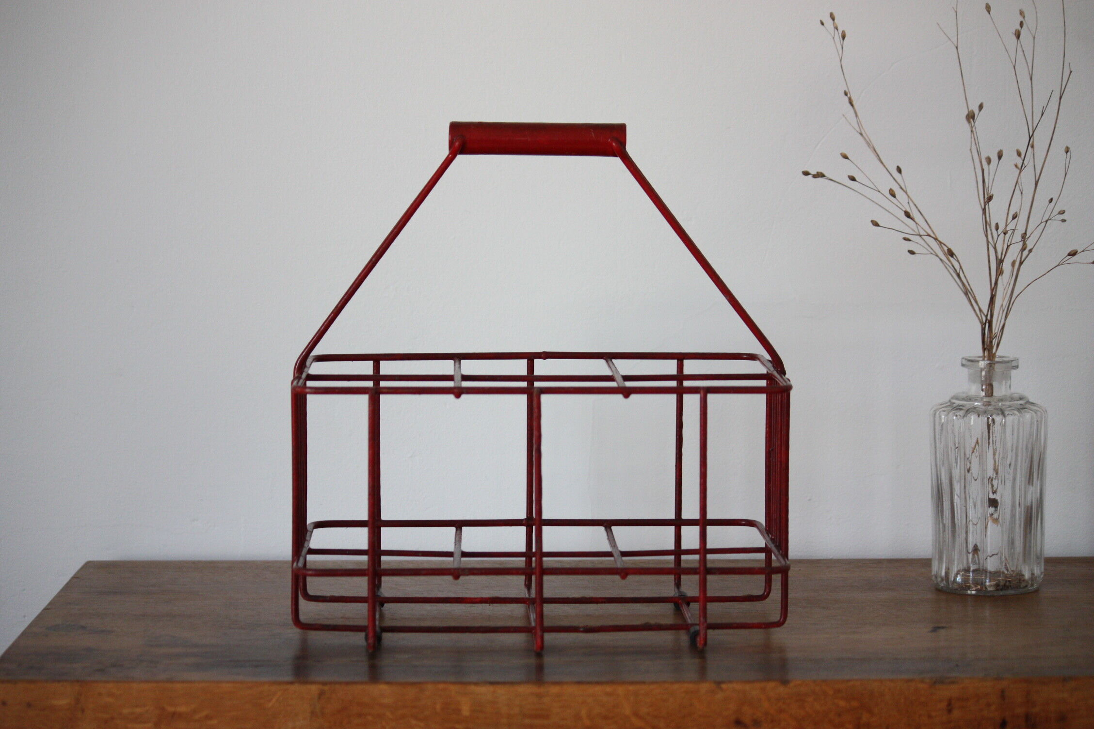 Red metal bottle holder