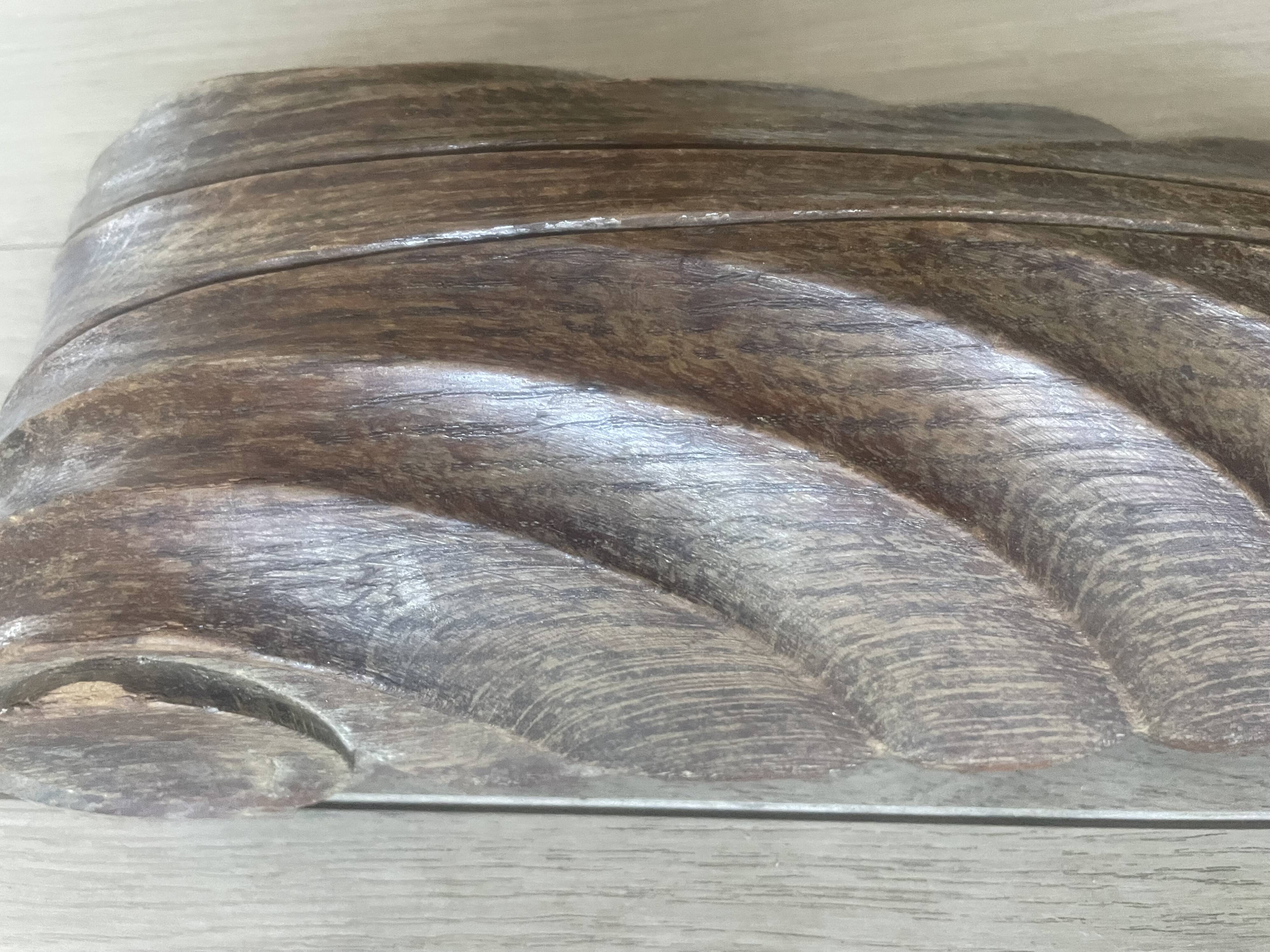 four decorative carved wooden objects