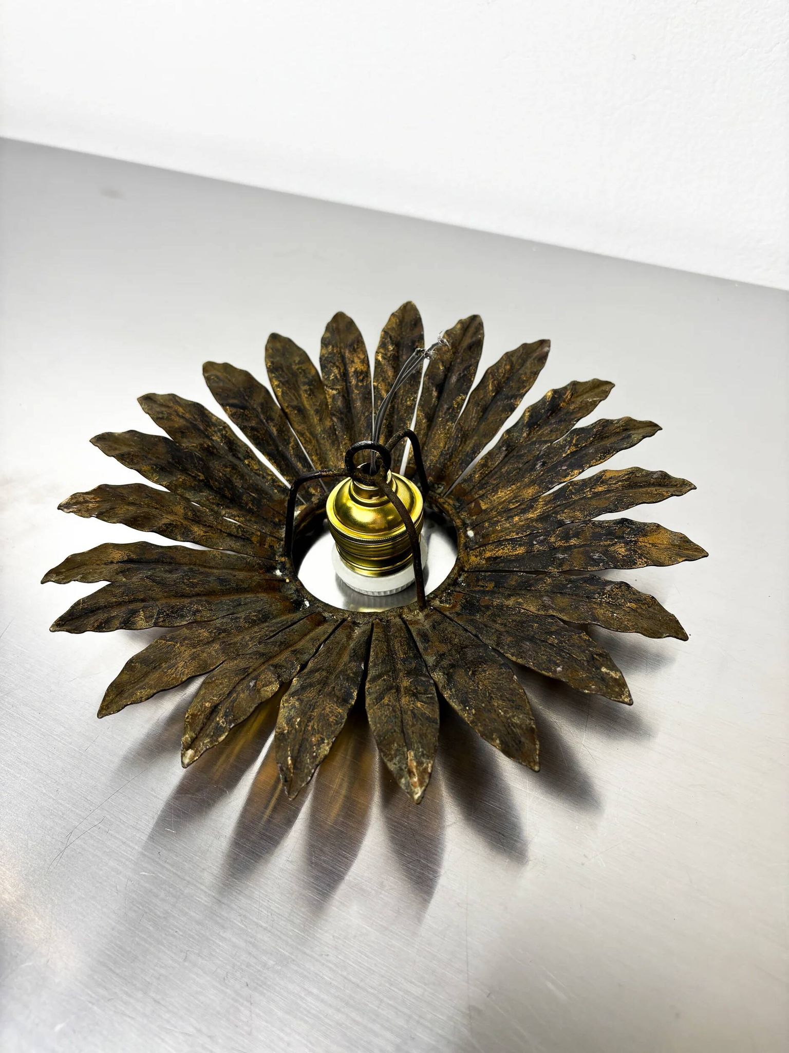 Spanish sunburst flush mount light fixture in gilt iron, circa 1960s