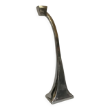 Large silver metal candlestick in the style of Xavier Lust