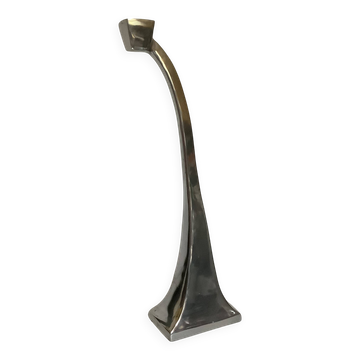 Large silver metal candlestick in the style of Xavier Lust