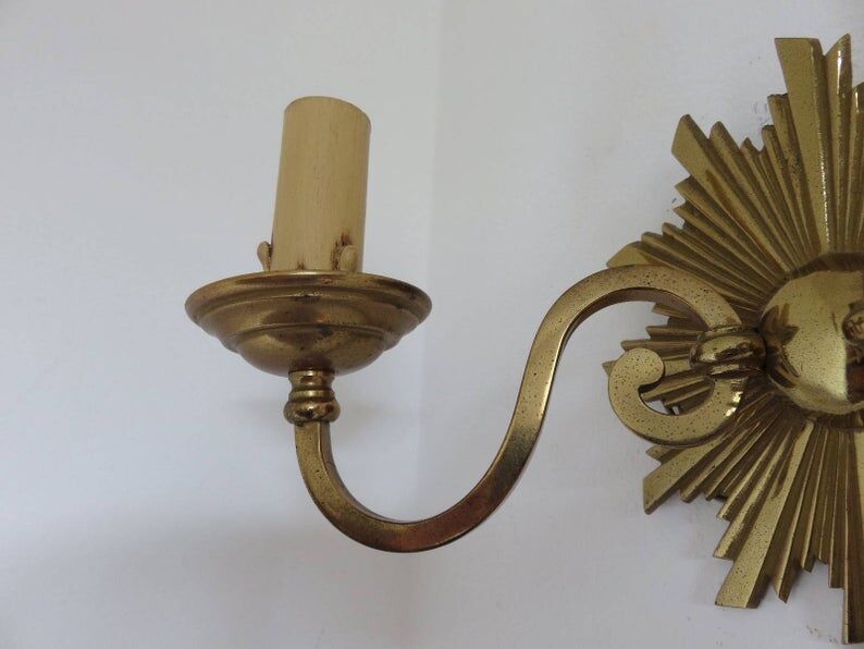 Wall lamp "little sun" in 70s golden brass