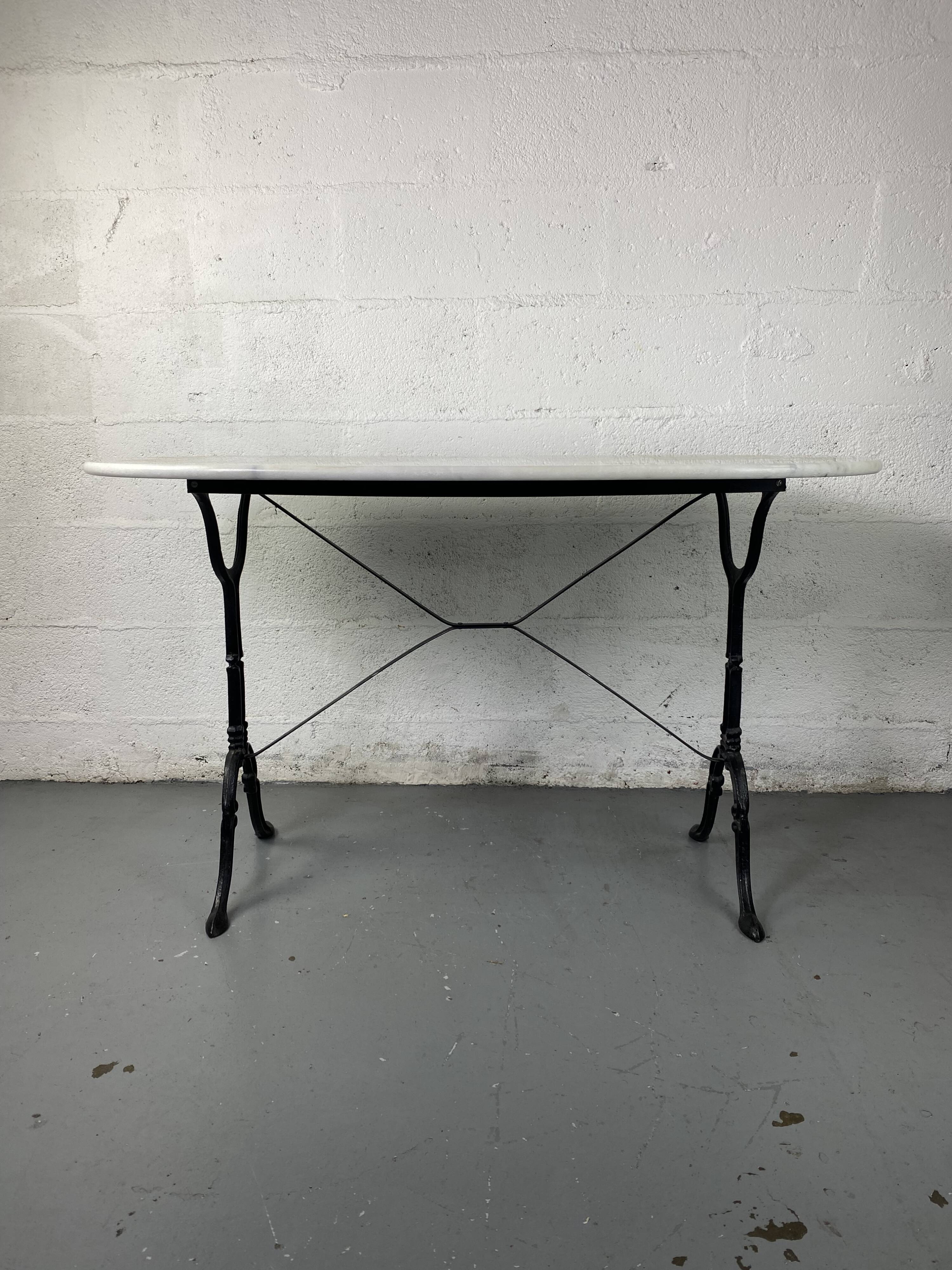 Marble and wrought iron bistro table