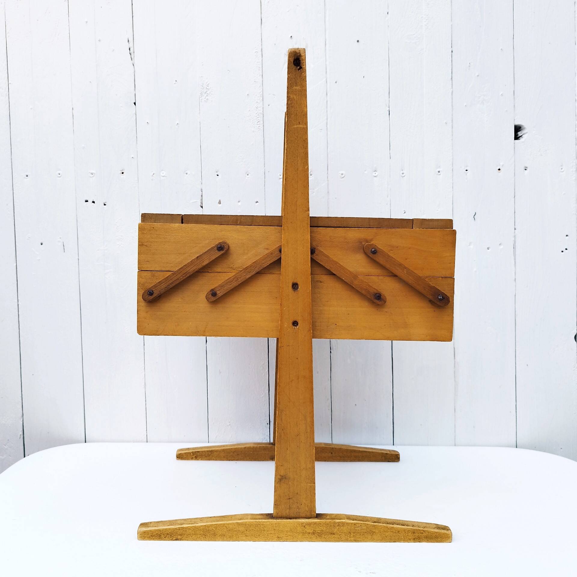 Old wooden folding sewing box