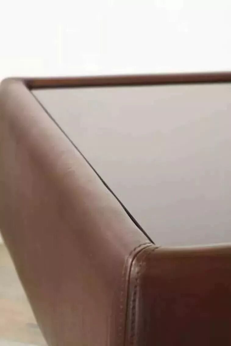 Black leather and glass coffee table