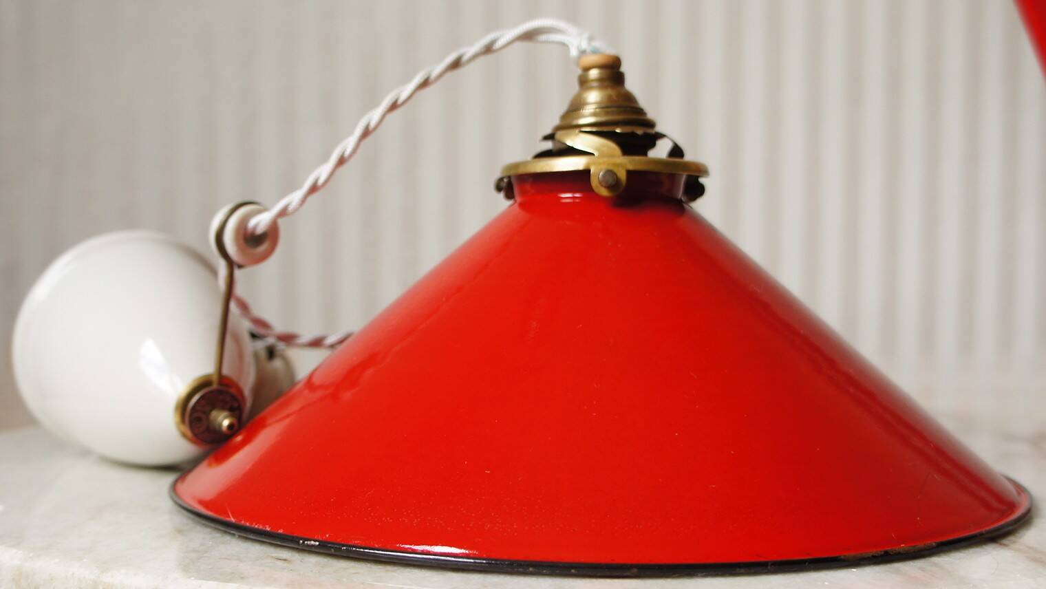 Enamelled sheet metal pendant rises & falls 1920