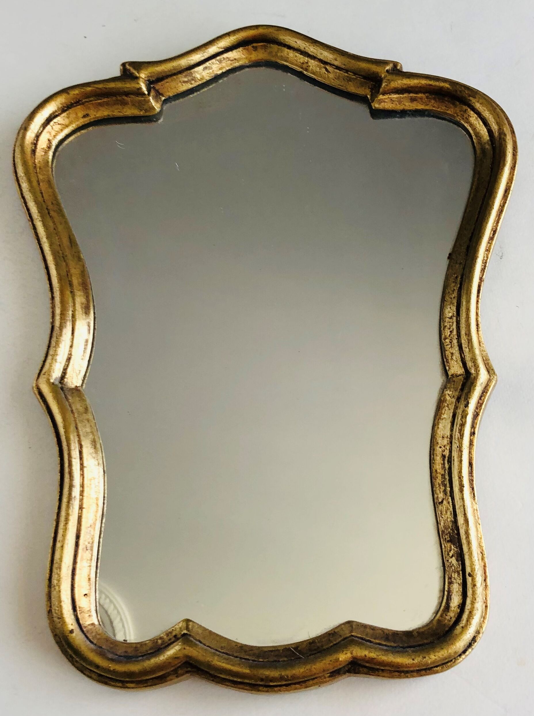 Small golden mirror