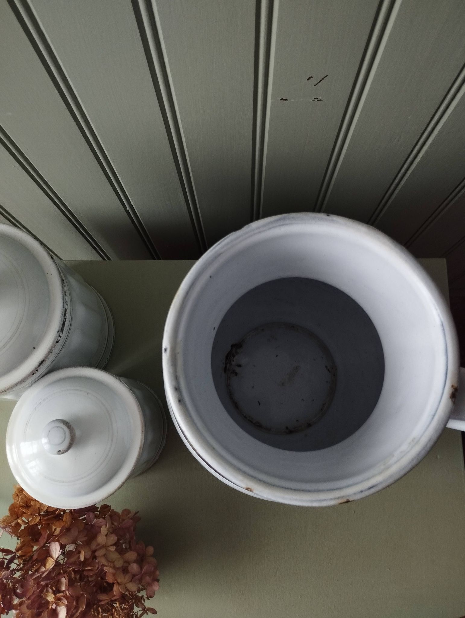 Rare large, pot-bellied toilet jug in white enamelled sheet metal with gold edging