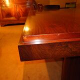 Modernist dining table in rosewood veneer.