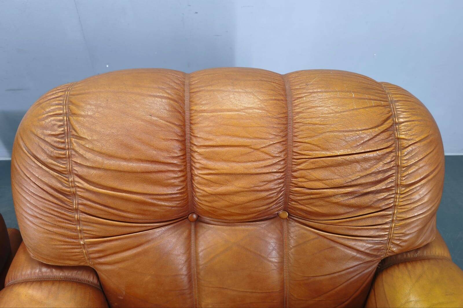 Pair of modern Italian armchairs from the mid-20th century, cognac leather, 1970.
