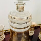 Carafe liqueur service with 8 gilded crystal glasses from the 1930s