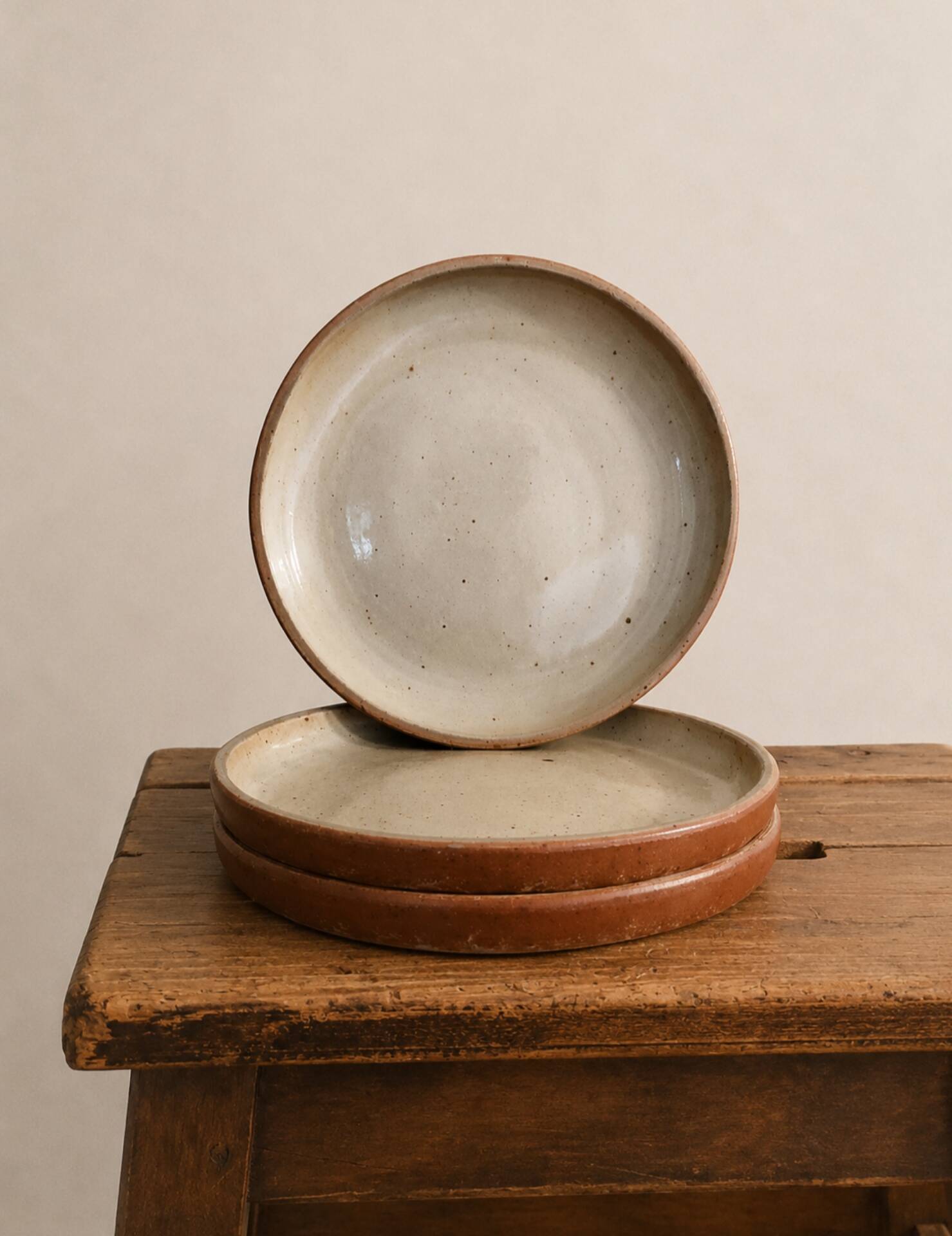 Set of 3 antique glazed stoneware plates.