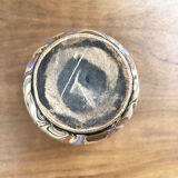 Vase dripping in varnished earth