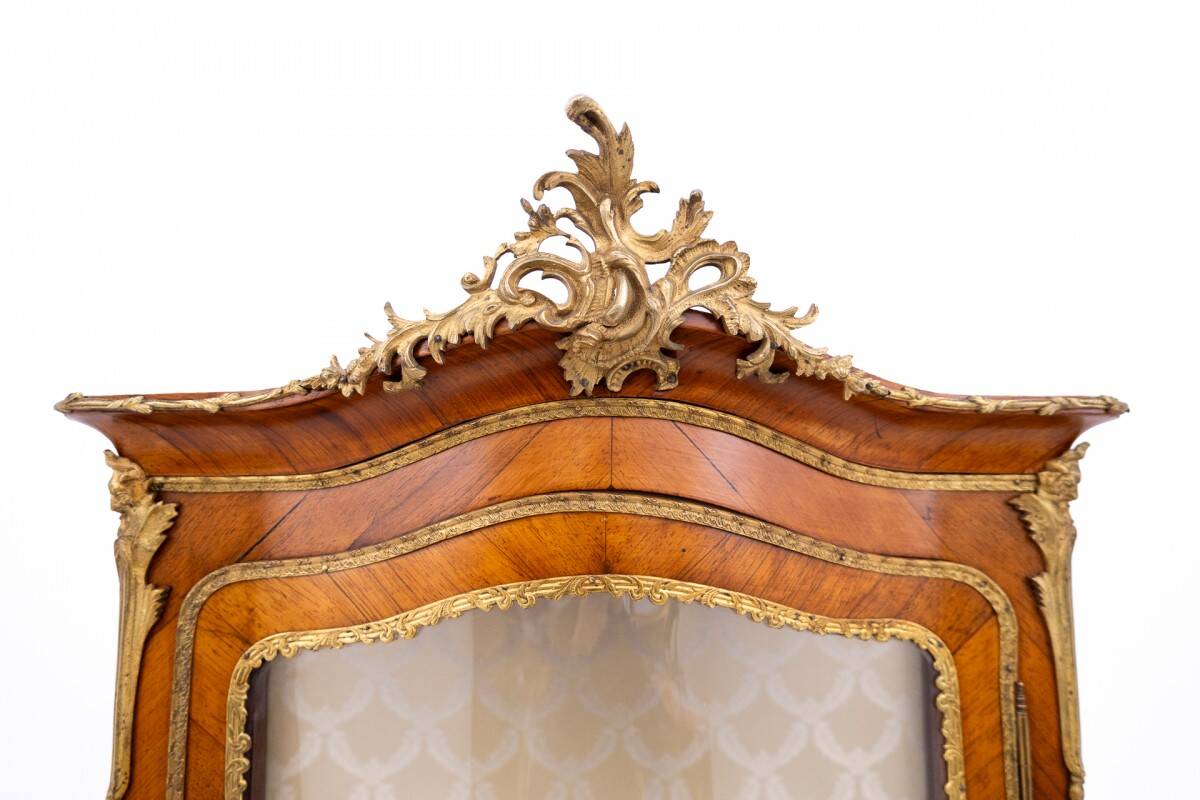 An unusual display cabinet in the Louis XV style, France, circa 1870.