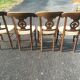 Set of four Directoire-style straw-seated chairs