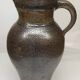 Metallic brown stoneware vase