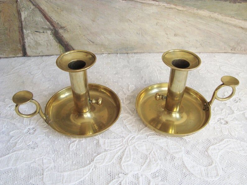 Pair of old brass candlesticks