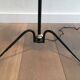 Floor lamp in black lacquered metal and brass