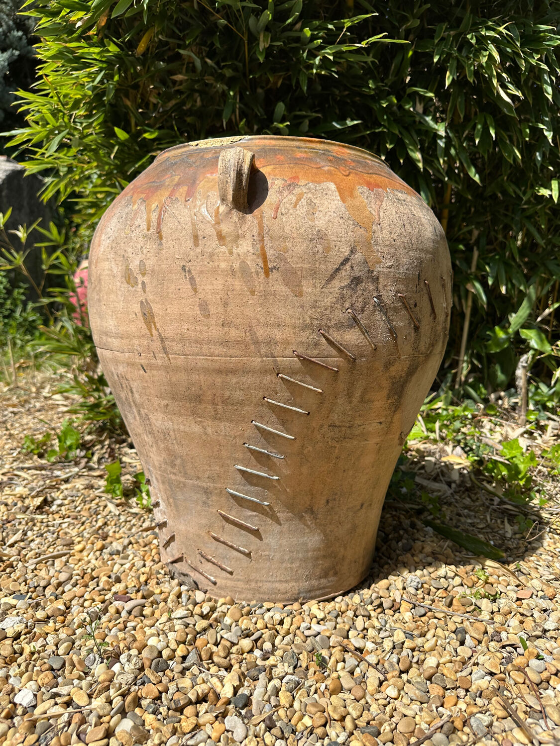 Ancient terracotta pottery jar from the 19th century.