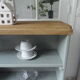 Vintage bookcase green of gray wooden top