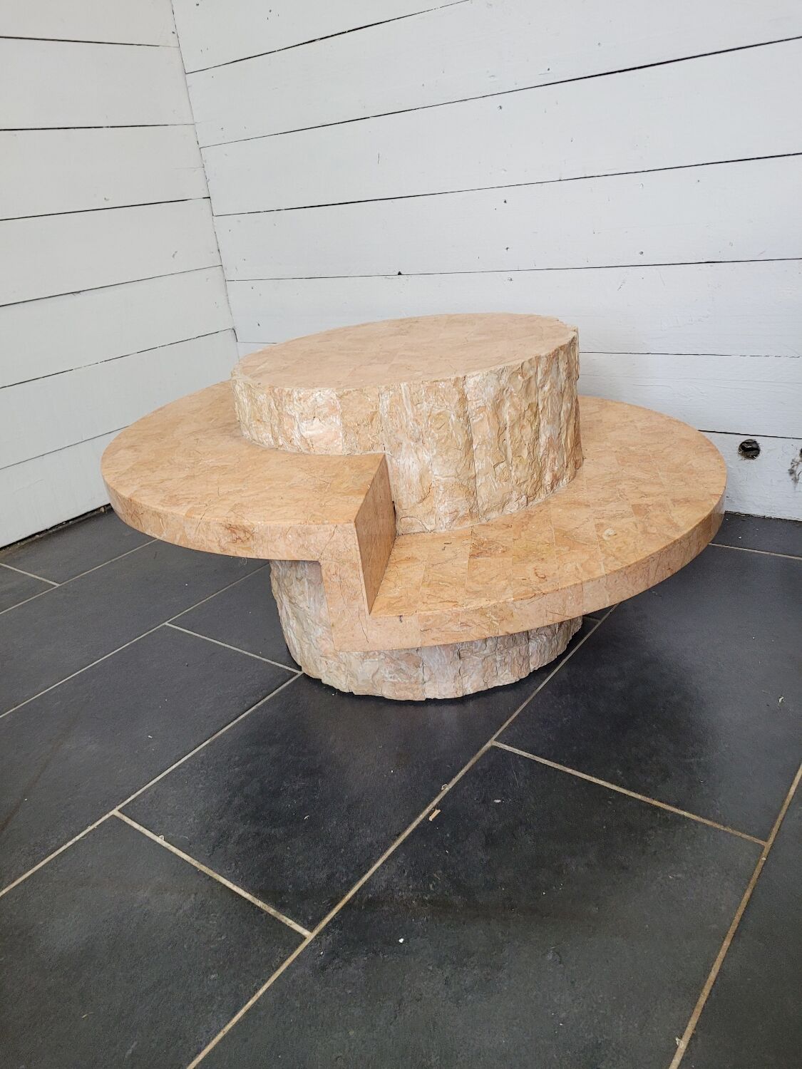 Round stone coffee table by Magnussen Ponte