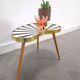 1950s kidney-shaped black and white table, plant table.