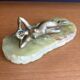 Art Deco female sculpture in bronze with onyx base.