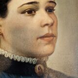 Oil on canvas portrait in an antique gilded wooden frame.