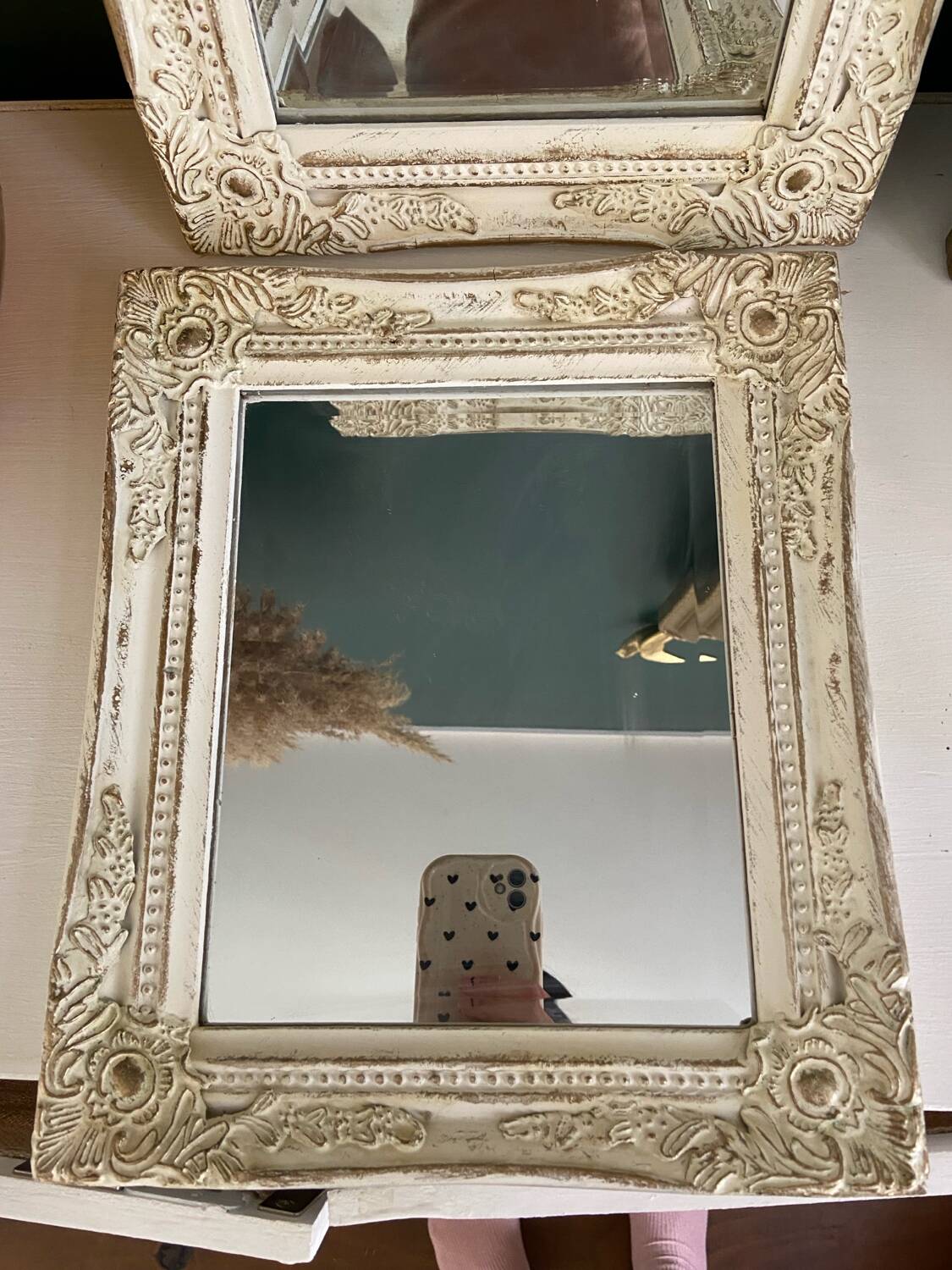 Set of two pretty mirrors in white, beige, and gold tones. Bohemian
