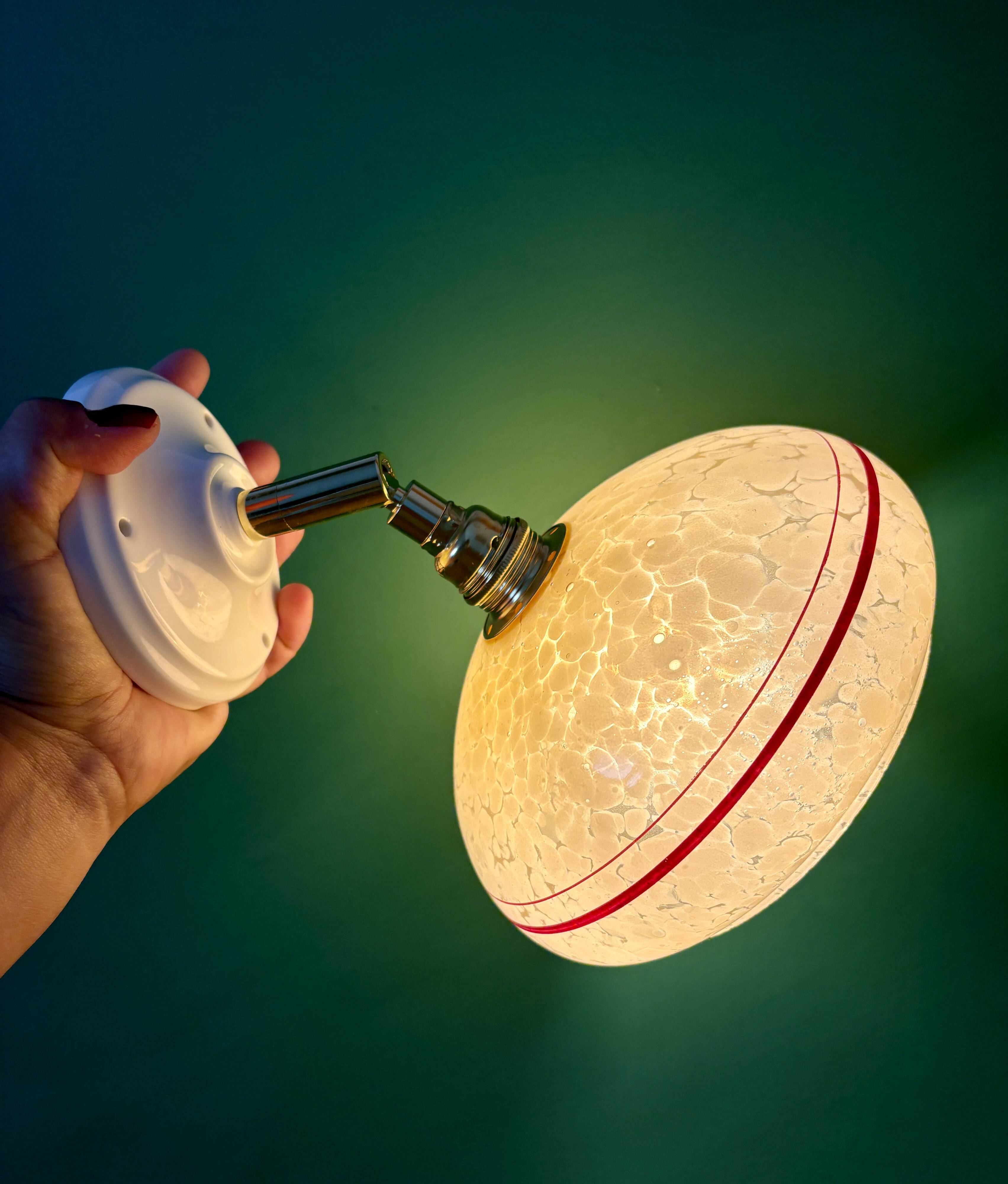 Vintage wall lamp with yellow clichy glass shade and red trim
