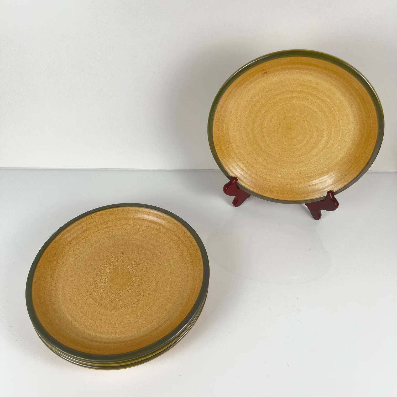 Set of 4 Salins plates with green rim, 20th century