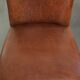 Set of 6 sheepskin dining chairs in a cognac colour with a lovely patina
