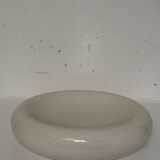 Empty pocket, cracked ceramic dish 1980