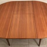 Scandinavian round teak dining table from the 60s extendable