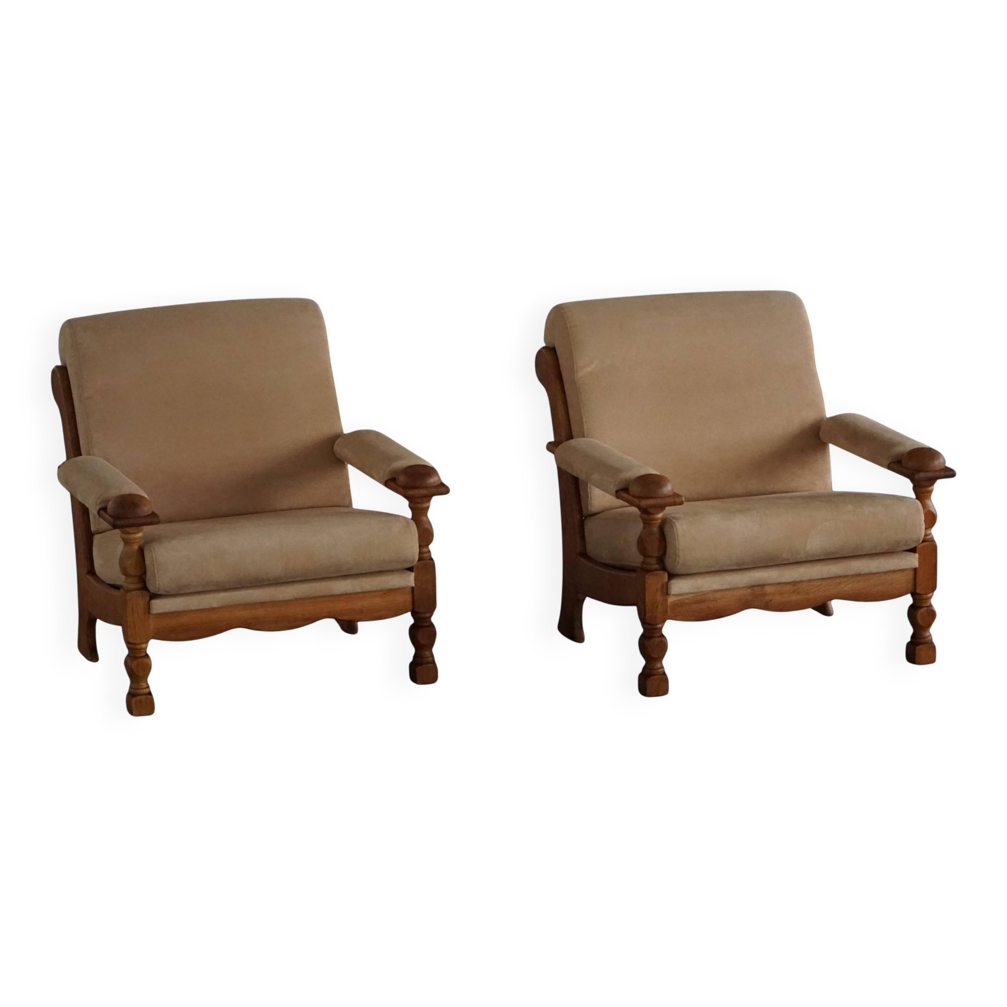 Mid-20th century, pair of armchairs by Henning Kjærnulf, oak and alcantara, 1960s.