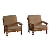 Mid-20th century, pair of armchairs by Henning Kjærnulf, oak and alcantara, 1960s.