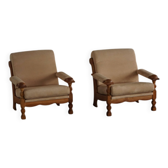 Mid-20th century, pair of armchairs by Henning Kjærnulf, oak and alcantara, 1960s.