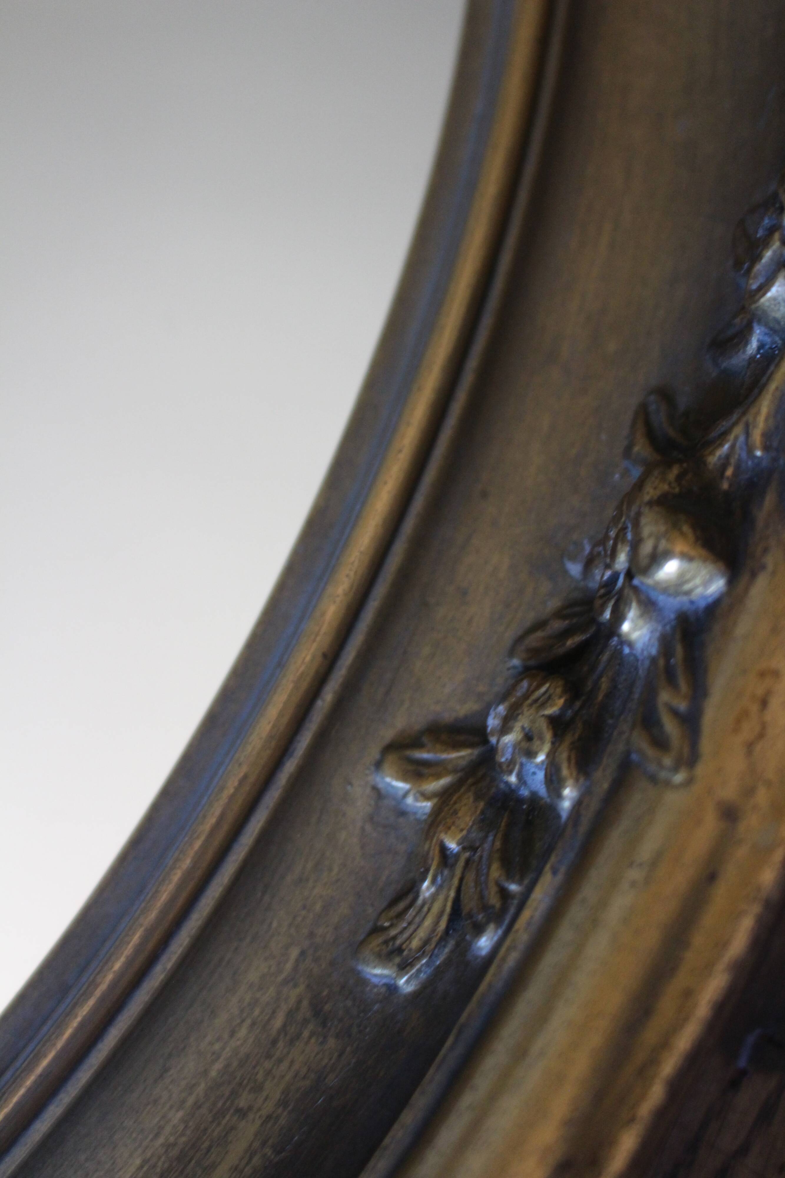 Golden Oval Mirror with Bow and Roses Decor