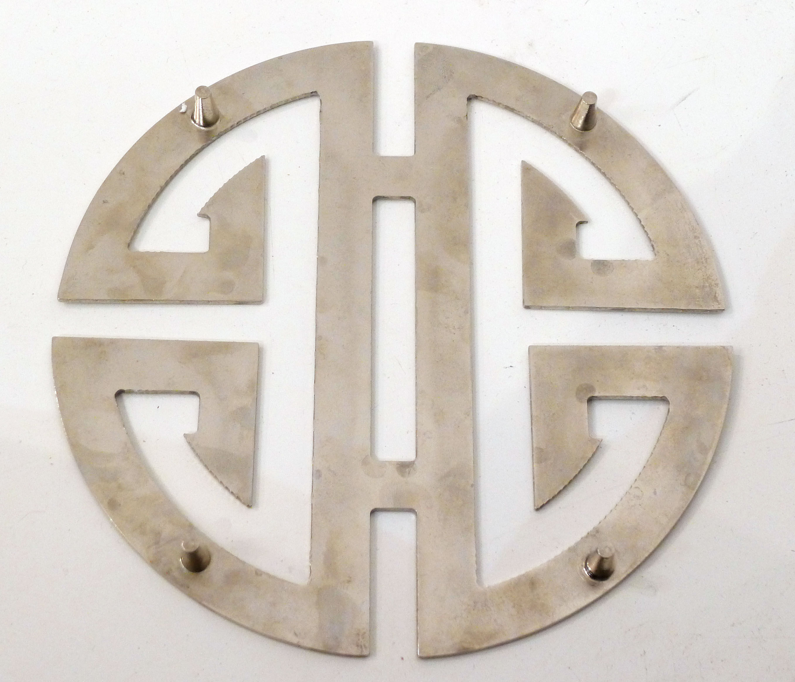 Under the geometric plate opened