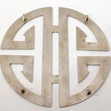 Under the geometric plate opened