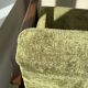 1970s green velvet armchair