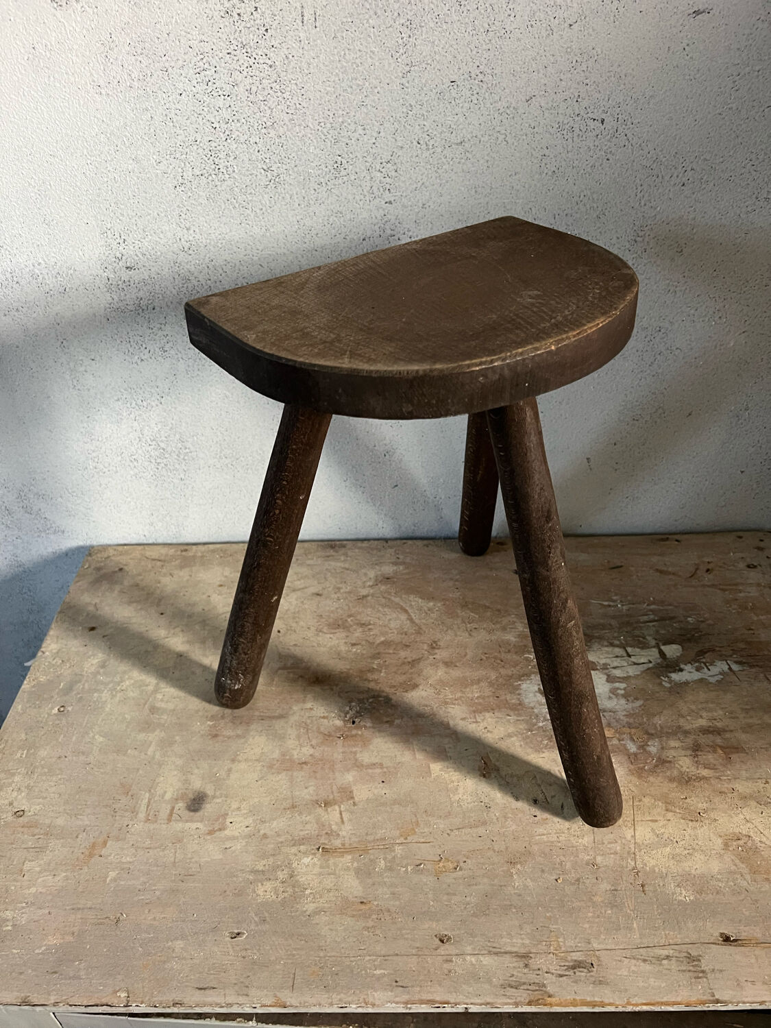 Wooden tripod stool