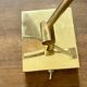 Pair of vintage brass wall lights with adjustable arms.